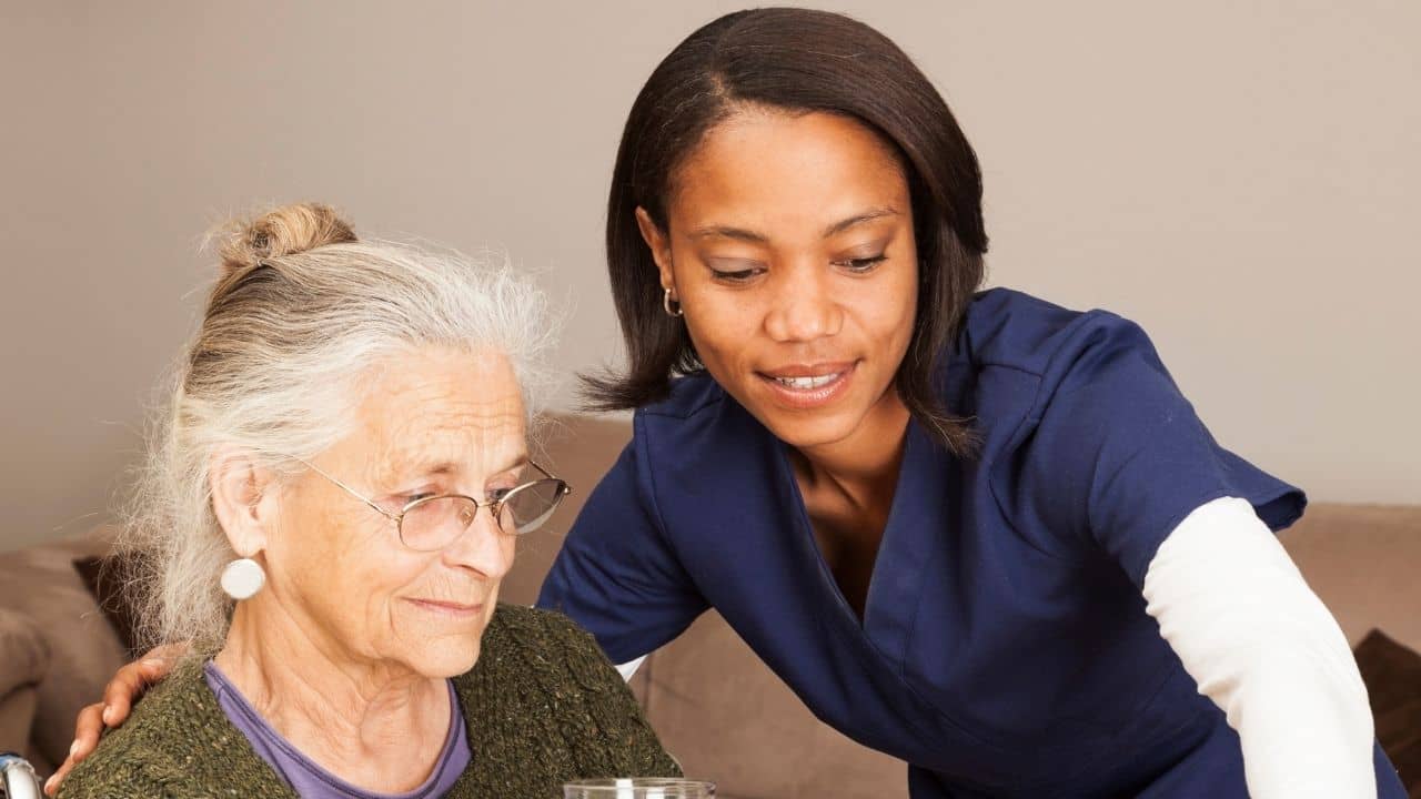 caregiver explaining to their patient