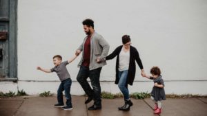 young family walking