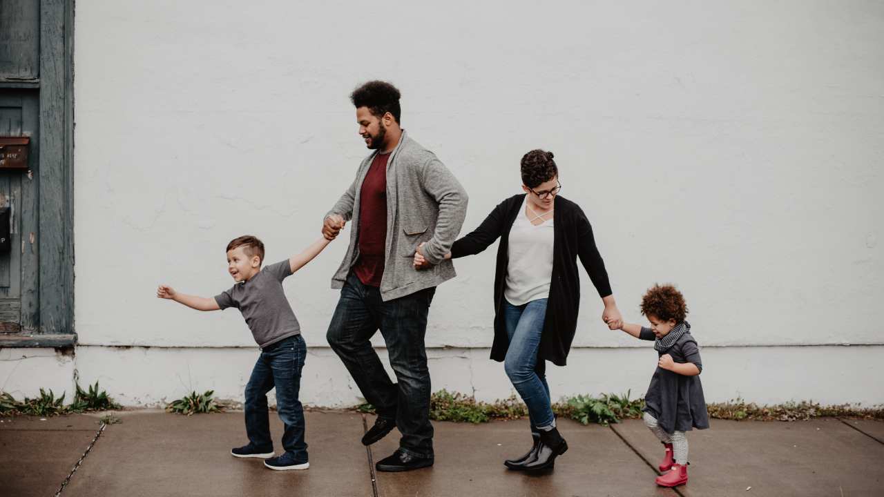 young family walking
